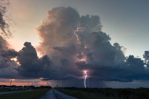 lightning striking the road