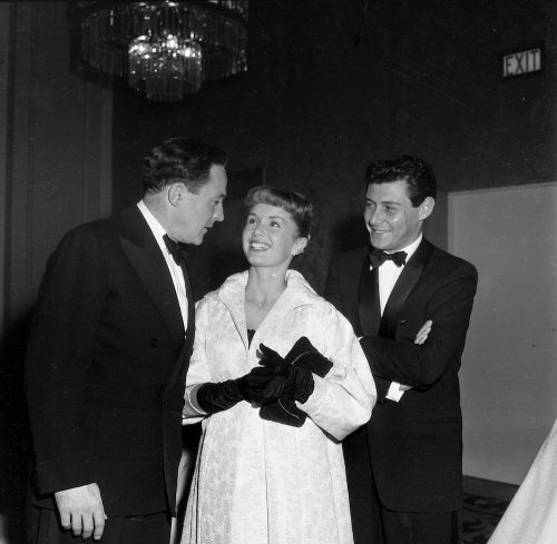 Gene Kelly, Debbie Reynolds, and Eddie Fisher at the Screen Producers Awards in 1957