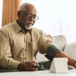 Senior Black Man Measuring Blood Pressure