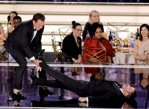 Will Arnett and Jimmy Kimmel onstage at the 2022 Emmys