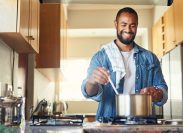 man cooking healthy meals to fight cancer