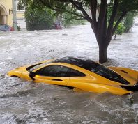 Video Shows Brand New $1 Million McLaren Supercar Washed Up by Hurricane Ian 