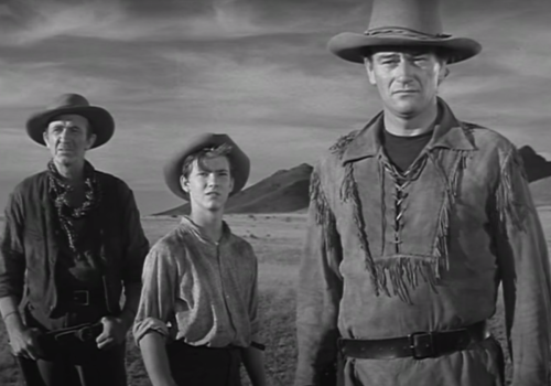 Walter Brennan, Mickey Kuhn, and John Wayne in "Red River"