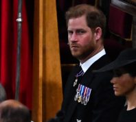 Prince Harry, Duke of Sussex and Meghan, Duchess of Sussex attend the State Funeral of Queen Elizabeth II at Westminster Abbey on September 19, 2022 in London, England