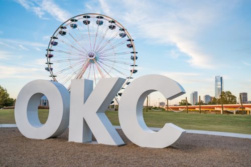 OKC Sign in Front of Ferris Wheel
