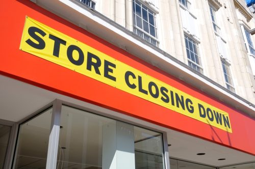 A shop hit by the recession letting shoppers know that it is closing down.See more signs here: