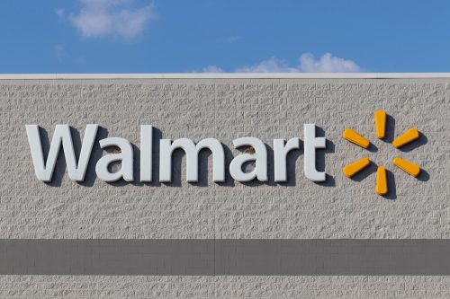 A Walmart sign on the wall of a store