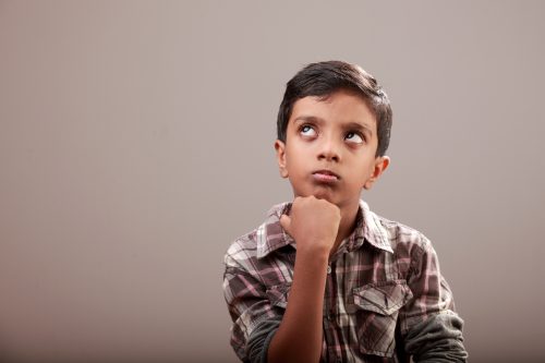 little boy thinking - would you rather questions for kids