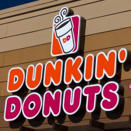 The exterior signage of a Dunkin' Donuts location