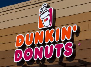 The exterior signage of a Dunkin' Donuts location