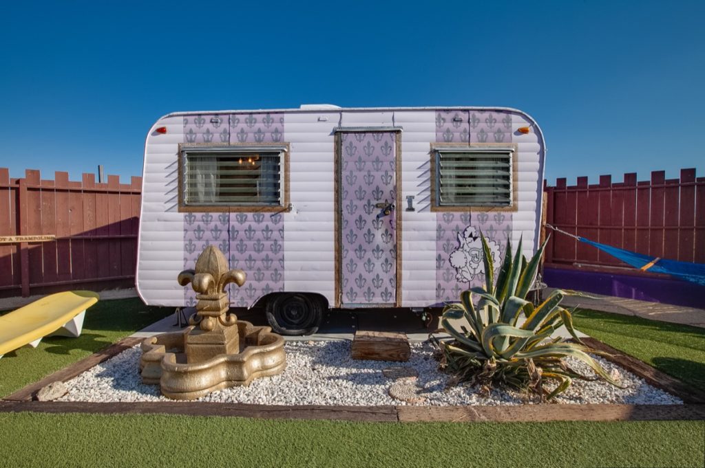 The Fifi trailer at Hicksville Trailer Palace with lawn dressings out front