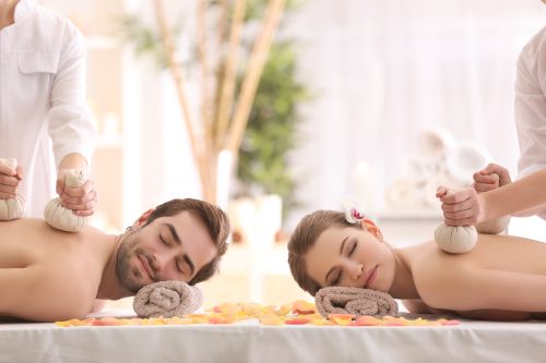 couple enjoying a spa treatment together