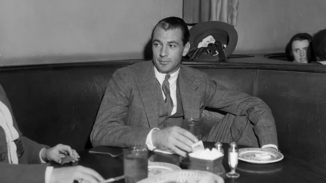 Gary Cooper photographed at a restaurant date unknown