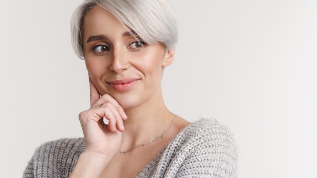 7 Tips for Going Gray Before 50, According to Hairstylists