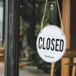 closed sign in store window