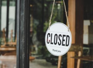 closed sign in store window