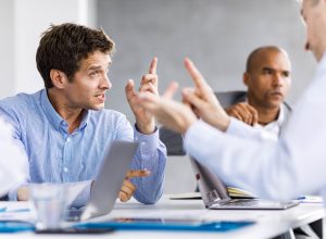 Frustrated entrepreneurs arguing during a business meeting in the office.