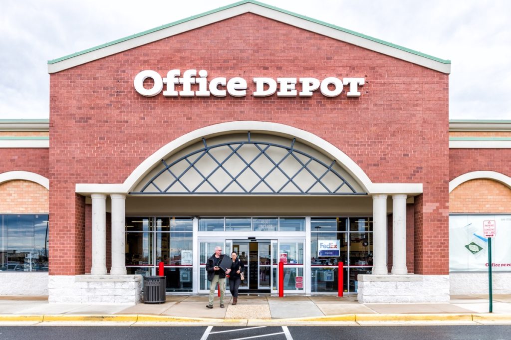 Office Depot store in Fairfax county, Virginia shop exterior entrance with sign, logo, doors , couple walking out