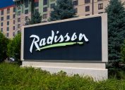 A sign for a Radisson Hotel