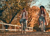 Couple Riding Bikes in the Fall