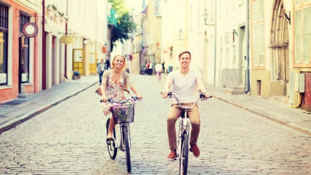 Two People Riding Bikes