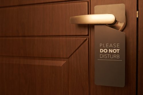 do not disturb sign on door