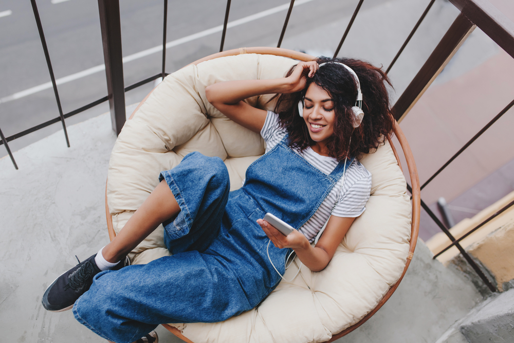 woman sitting in a chair relaxing
