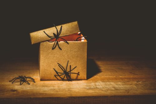 Spiders climb around a box decoration idea.