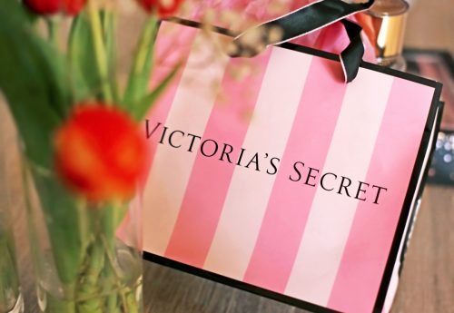 Victoria's Secret perfum bottles and shopping bag. Editorial use.