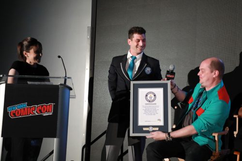 Mike Flanagan receiving the Guinness World Record certificate at New York Comic Con in October 2022