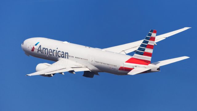 An American Airlines jet taking off in the sky