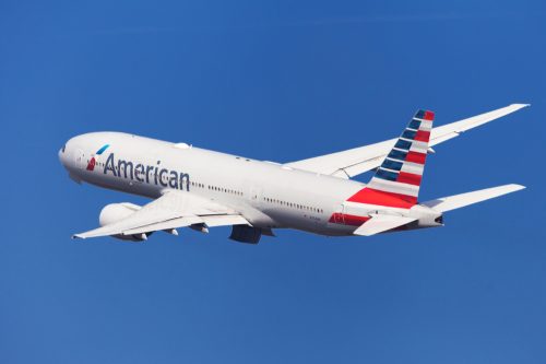 An American Airlines jet taking off in the sky