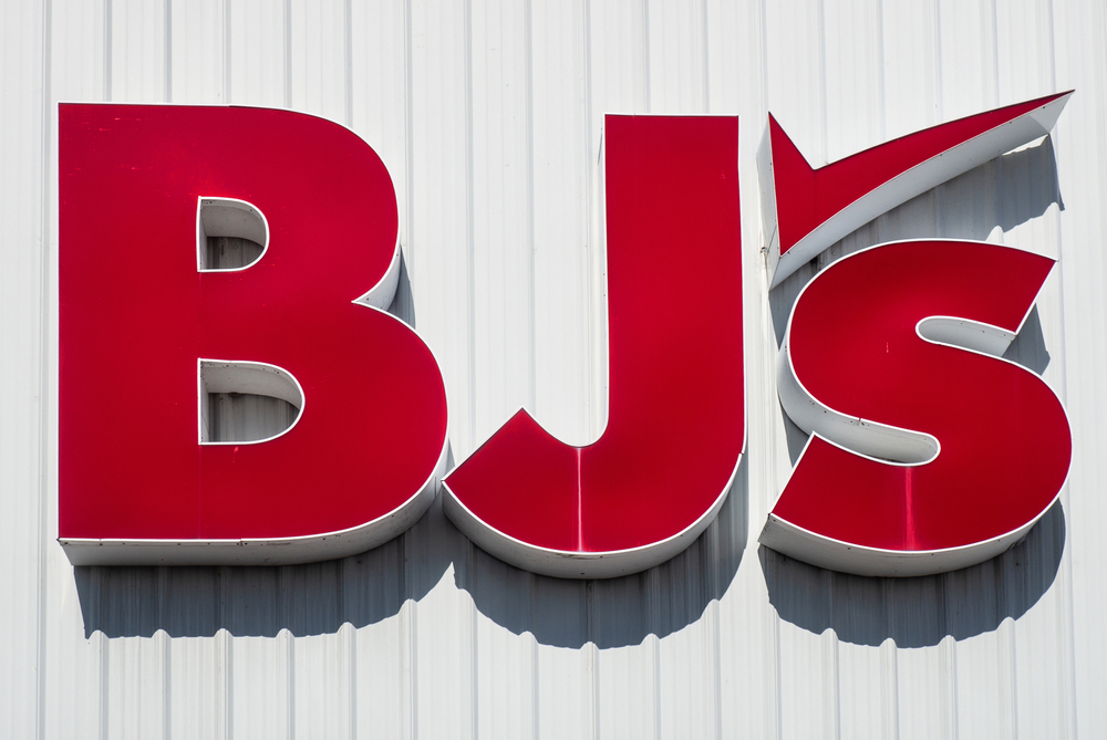 A close up of a BJs Wholesale sign