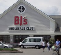 The storefront and parking lot of a BJ's Wholesale Club