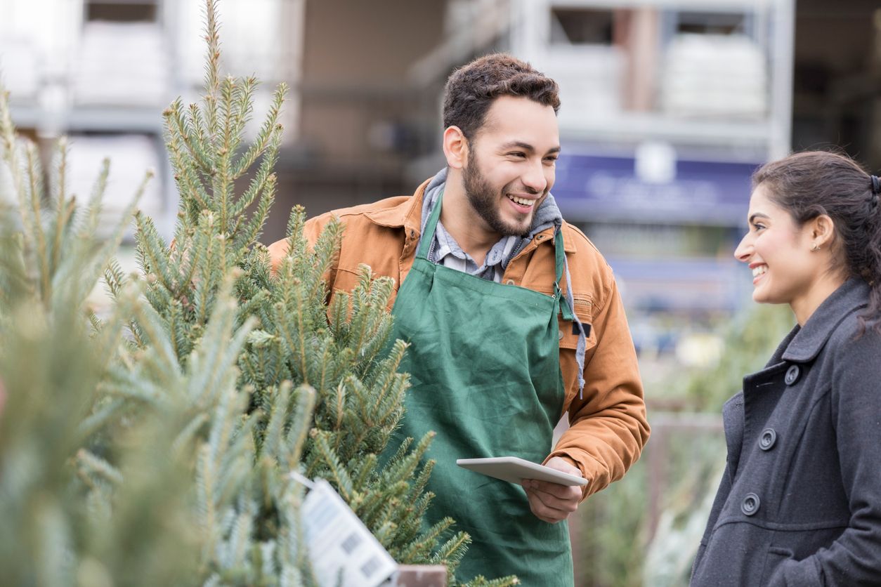 A helps customers. Чаруель Сток. Seasonal jobs. Seasonal work.