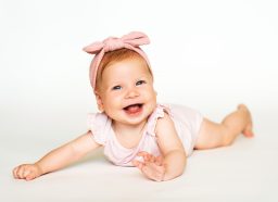 baby girl in pink bow