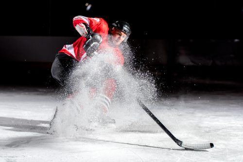 man playing ice hockey