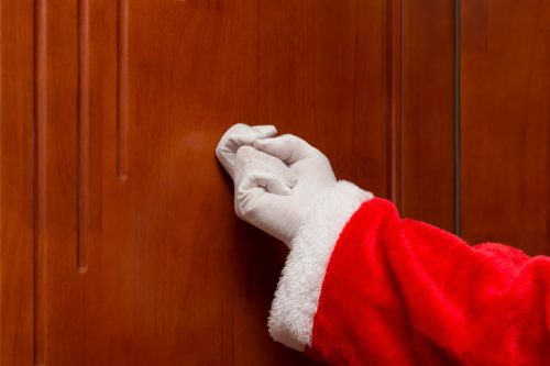 santa knocking on a door
