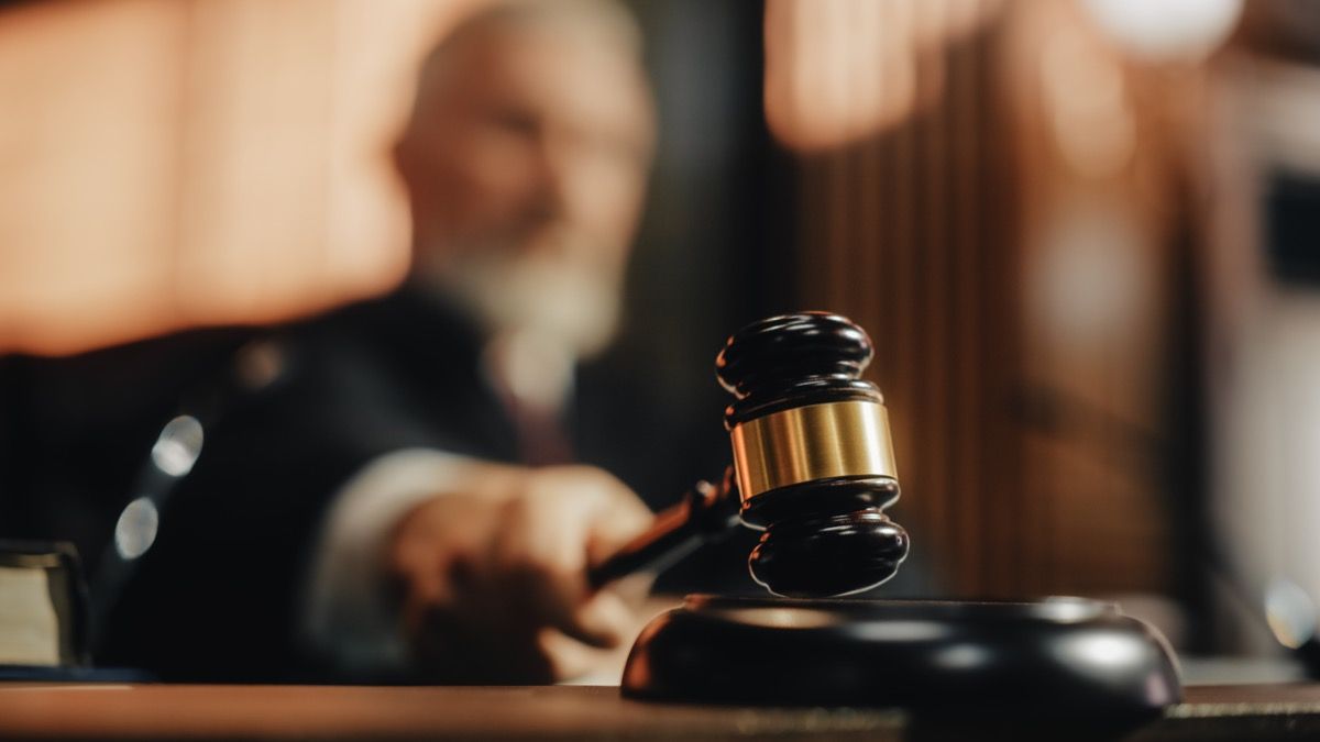 Blurred judge pounding a gavel