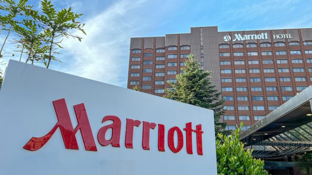 A Marriott sign in front of a Marriott hotel