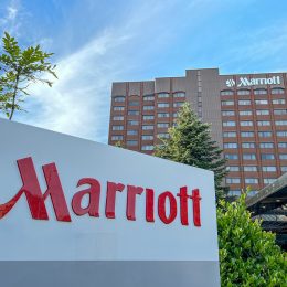 A Marriott sign in front of a Marriott hotel