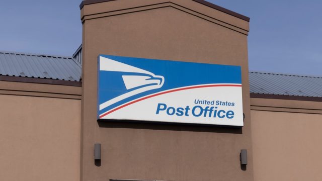Chicago – Circa April 2022: USPS Post Office location. The USPS is responsible for providing mail delivery and providing postal service.