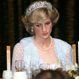 Sad Princess Diana At A Banquet In New Zealand Wearing A Blue Chiffon Evening Dress.
