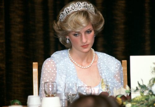 Sad Princess Diana At A Banquet In New Zealand Wearing A Blue Chiffon Evening Dress.