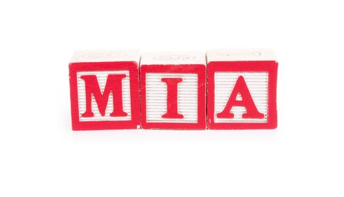 letter blocks spelling out the baby girl name Mia.