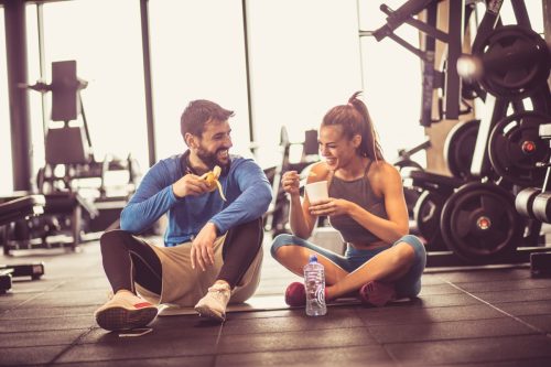 Couple Eating a Snack at the Gym