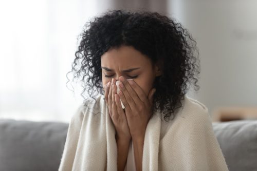 Young Woman Suffering From a Cold