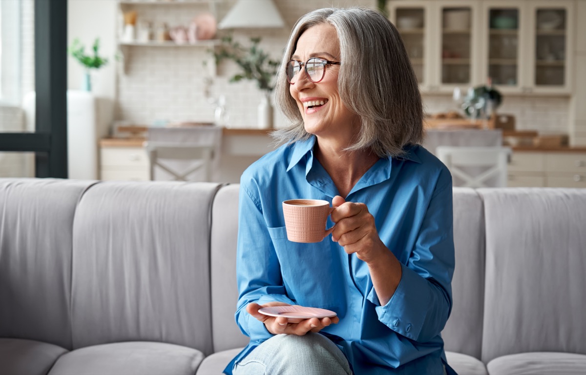 Older Woman Drinking Tea and Looking Refreshed