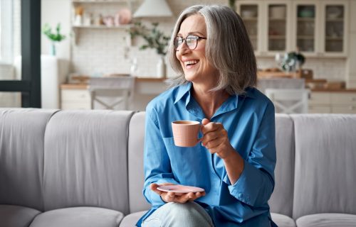 Older Woman Drinking Tea and Looking Refreshed