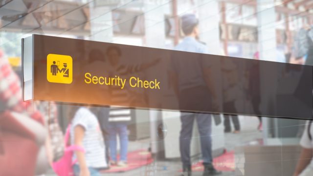sign for security checkpoint
